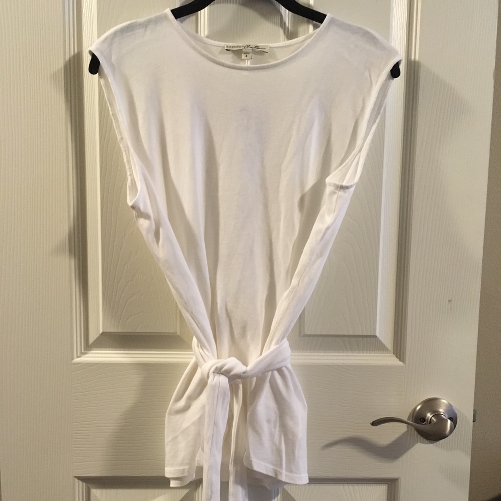 White EXPRESS knit blouse with tie waist.